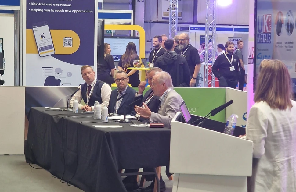 MEPS International's Kaye Ayub hosts the carbon steel panel debate at the UK Metals Expo 2023